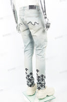 Light blue distressed rewashed tattered embroidered Skinny Jeans