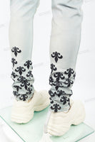 Light blue distressed rewashed tattered embroidered Skinny Jeans