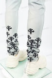 Light blue distressed rewashed tattered embroidered Skinny Jeans