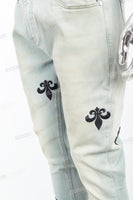 Light blue distressed rewashed tattered embroidered Skinny Jeans