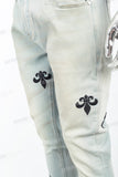Light blue distressed rewashed tattered embroidered Skinny Jeans