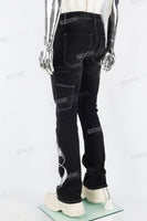 Black embroidered patchwork flared overalls