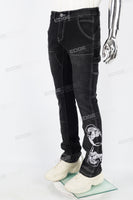 Black embroidered patchwork flared overalls