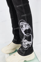 Black embroidered patchwork flared overalls