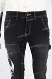 Black embroidered patchwork flared overalls