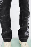 Black embroidered patchwork flared overalls
