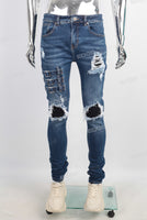 Blue biker damaged skinny jeans