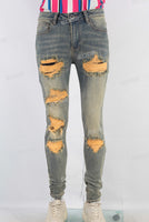 Acid washed damaged embroidered skinny jeans