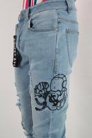 Blue damaged embroidered stack jeans