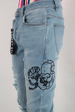 Blue damaged embroidered stack jeans