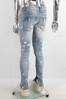 Blue damaged skinny jeans