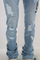 Blue damaged embroidered stack jeans