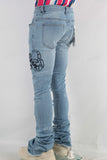 Blue damaged embroidered stack jeans