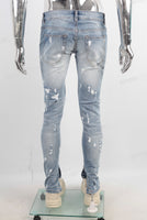 Blue damaged skinny jeans