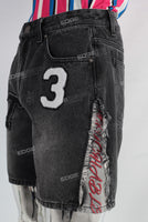 Embroidered digital print damaged jeans