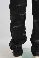 Black waxed zip up patchwork jeans