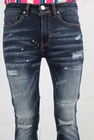 Blue damaged paint splatters skinny jeans