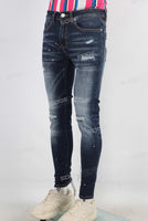 Blue damaged paint splatters skinny jeans
