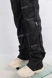 Black waxed zip up patchwork jeans