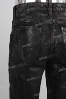 Black waxed flare jeans
