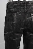 Black waxed flare jeans