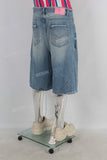 Blue acid washed damaged shorts