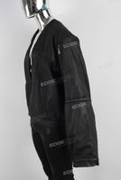 Black oversize and loose waxed jacket