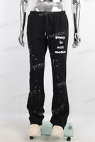 Men black digital paint splatters flared pants