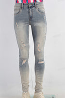 Blue acid washed damaged skinny jeans