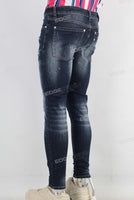 Blue damaged paint splatters skinny jeans