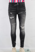 Black damaged skinny jeans