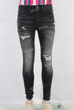 Black damaged skinny jeans