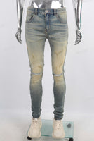 Green vintage damaged skinny jeans