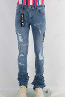 Blue damaged skinny stack jeans