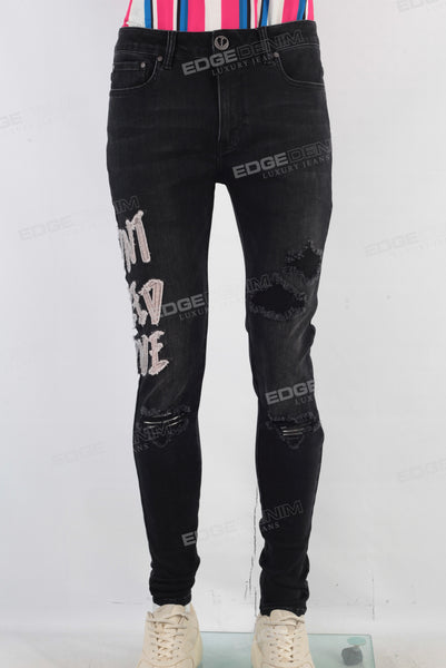 Black patchwork damaged skinny jeans
