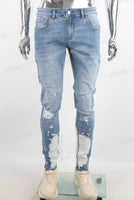 Blue tie dye damaged jeans