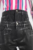 Double layered black waxed flared jeans