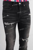 Black damaged skinny jeans