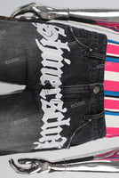 Black embroidered damaged shorts