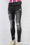 Black damaged skinny jeans