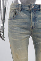 Green vintage damaged skinny jeans