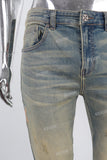 Green vintage damaged skinny jeans