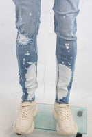 Blue tie dye damaged jeans