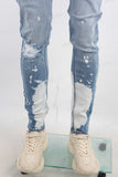 Blue tie dye damaged jeans