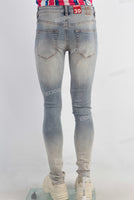 Blue acid washed damaged skinny jeans