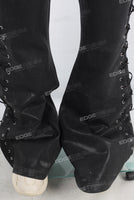 Double layered black waxed flared jeans