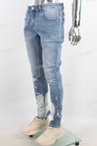 Blue tie dye damaged jeans