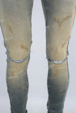 Green vintage damaged skinny jeans