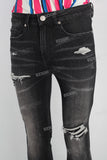 Black damaged skinny jeans