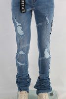 Blue damaged skinny stack jeans